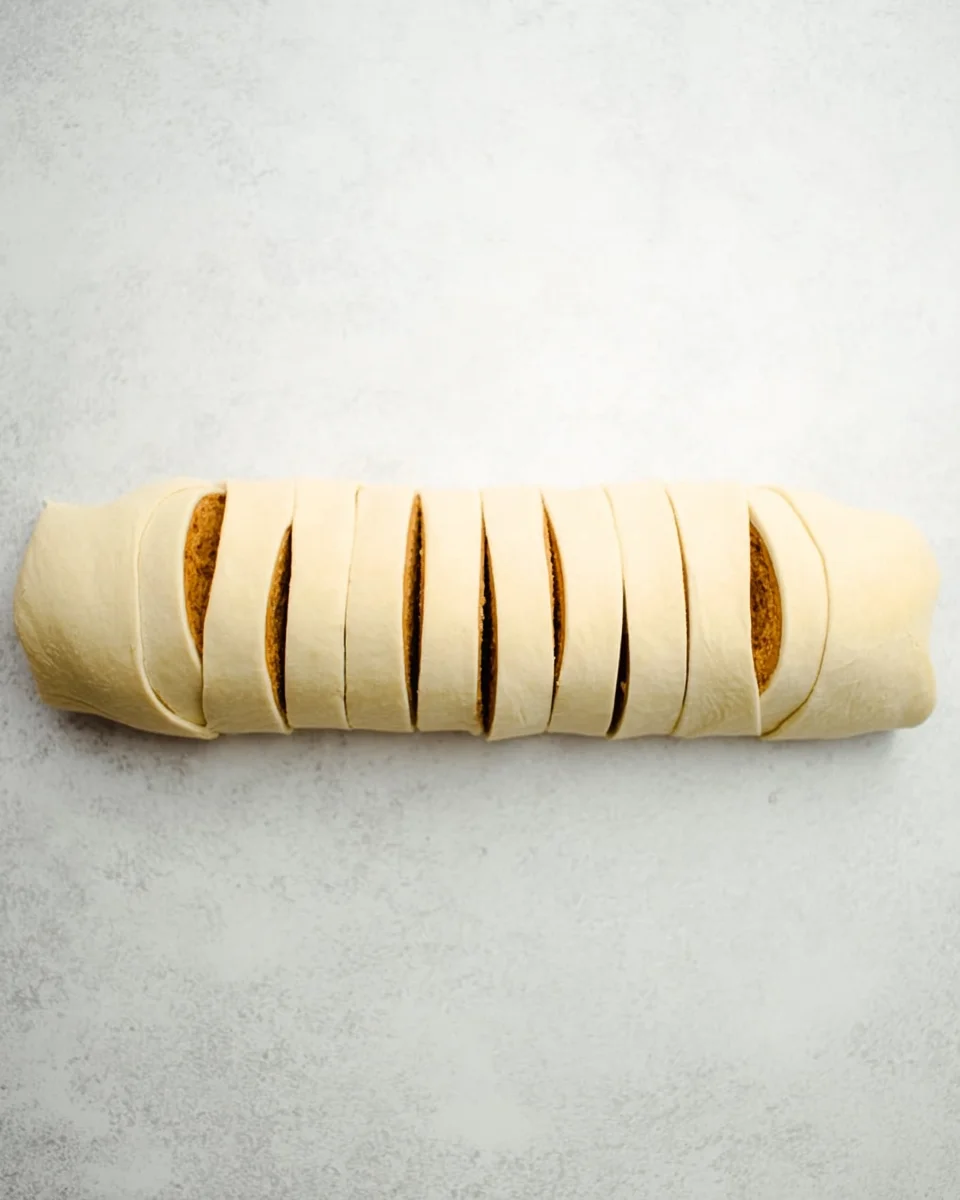 cylinder cut cross-wise into 12 rolls