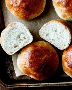 A halved brioche bun.