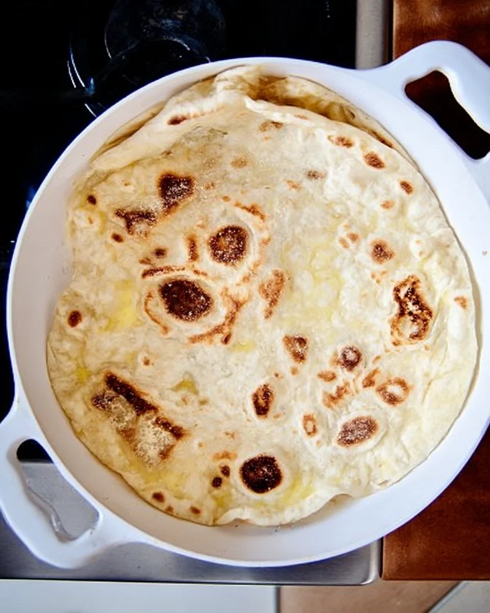A freshly griddled round of naan.