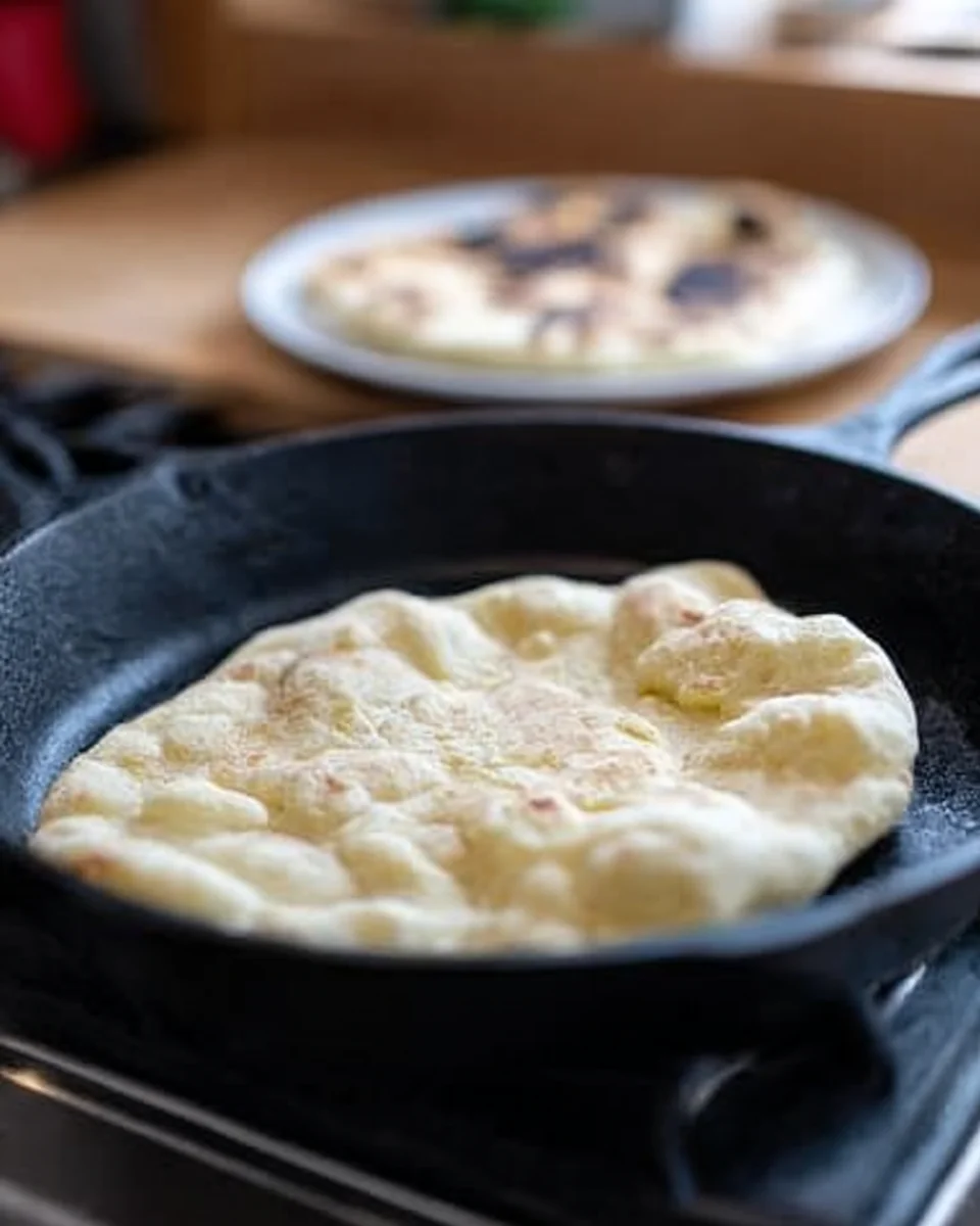 Naan in skillet.