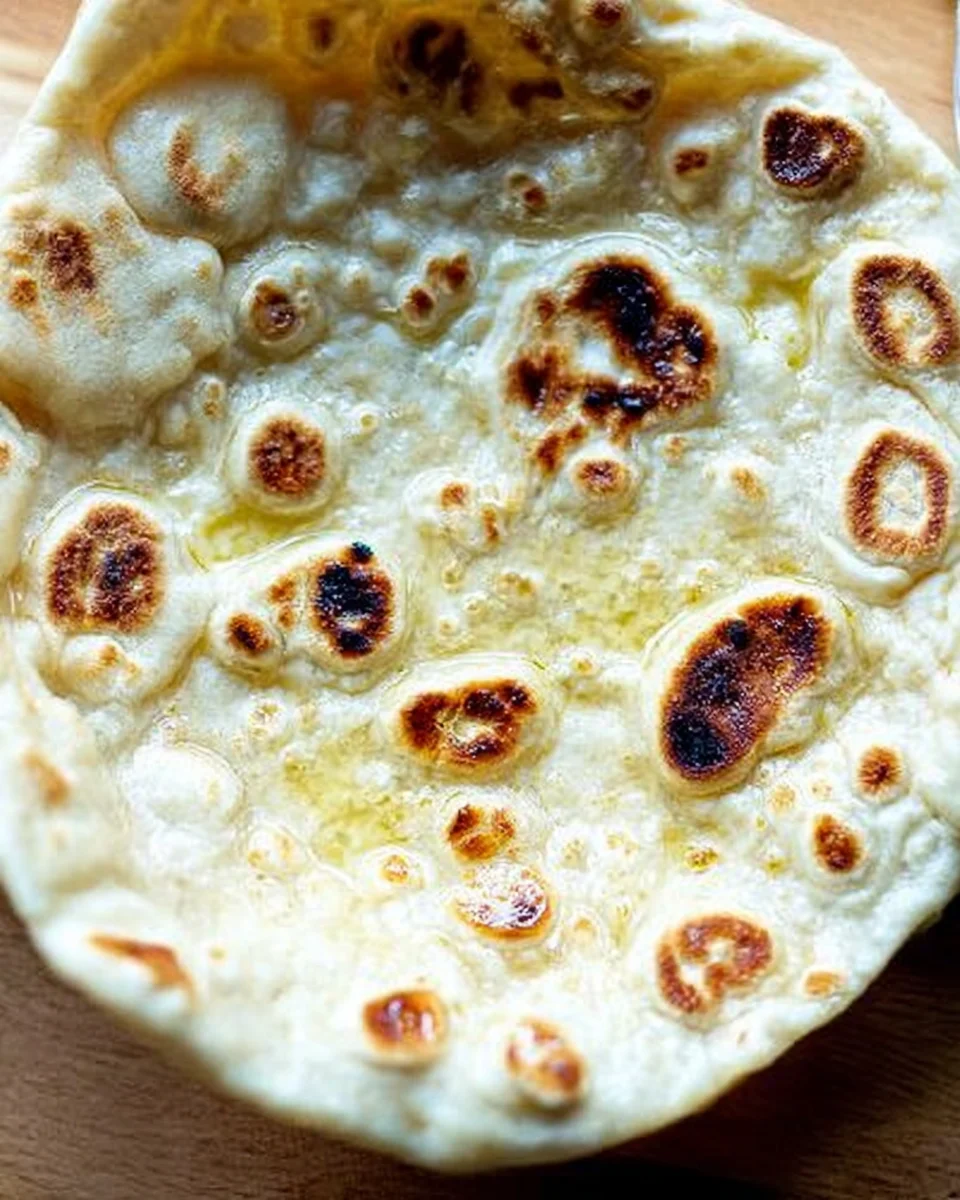 Just baked naan in a bowl.