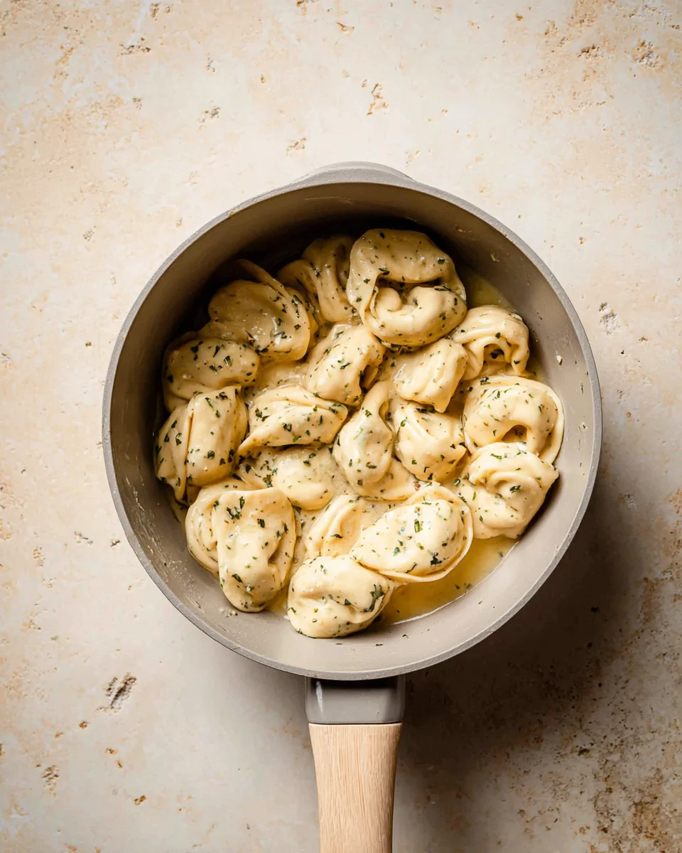 pull-apart-garlic-bread-18.jpg Homemade Pull Apart Garlic Bread is fluffy, buttery, flavourful, and tears easily for optimal sharing. You won't be able to stop grabbing these bites! | aheadofthyme.com