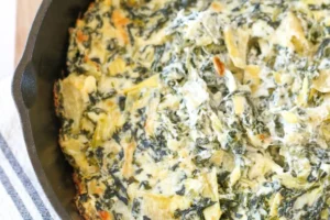 spinach artichoke dip in a skillet