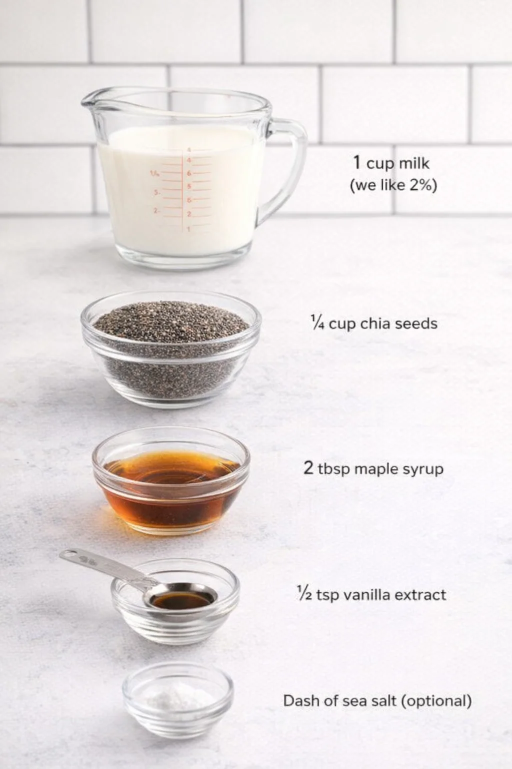 ingredients-placeholder.png Measured ingredients arranged for Vanilla Chia Pudding: 1 cup milk or milk alternative (we like 2%), ¼ cup chia seeds, measured level, 2 tbsp maple syrup (or preferred sweetener), ½ tsp vanilla extract, Dash of sea salt
