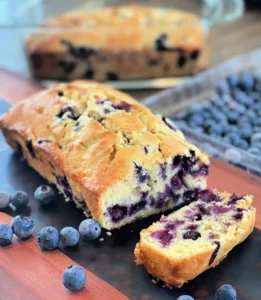 juicy blueberries throughout a quick bread recipe