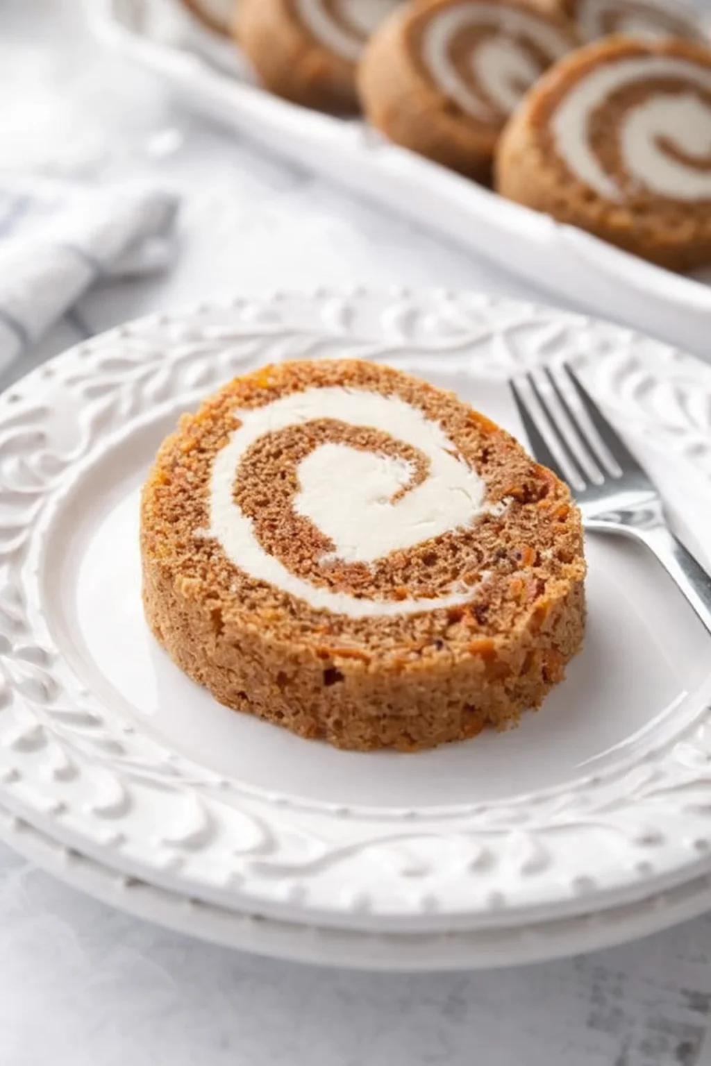 Final plated Carrot Cake Roll | Dessert Now Dinner Later served as a hero shot