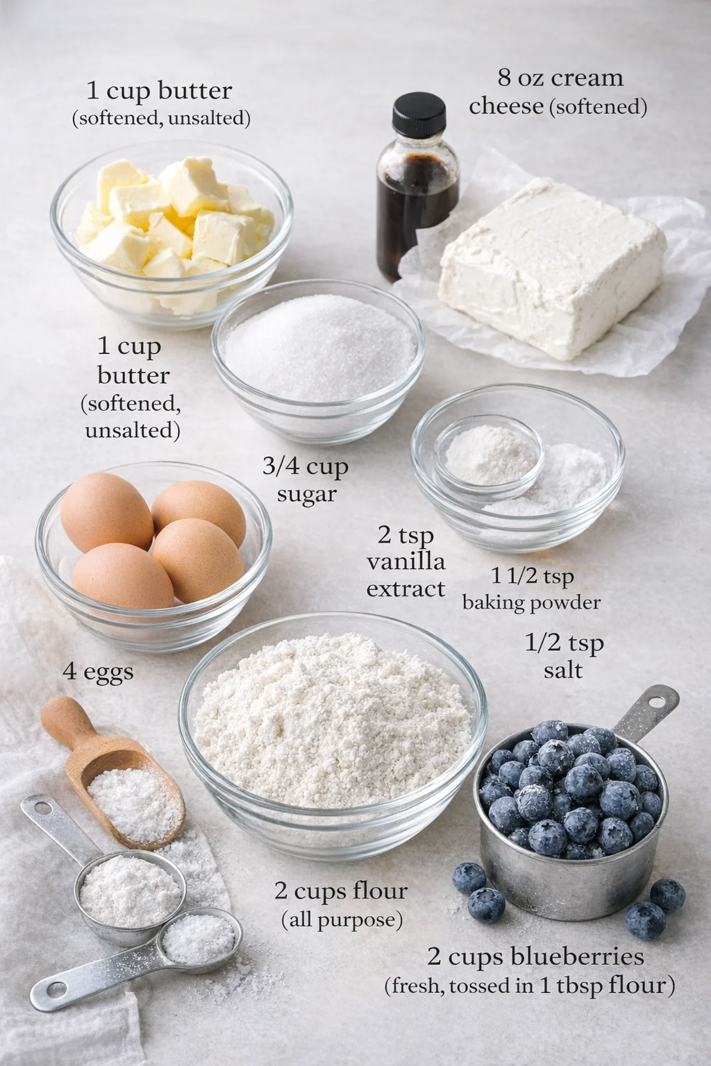 Measured ingredients arranged for Blueberry Cream Cheese Bread: 1 cup butter (softened/unsalted), 8 oz cream cheese (softened), 3/4 cup sugar, 2 teaspoon vanilla extract, 4 eggs, 2 cups flour (all purpose)