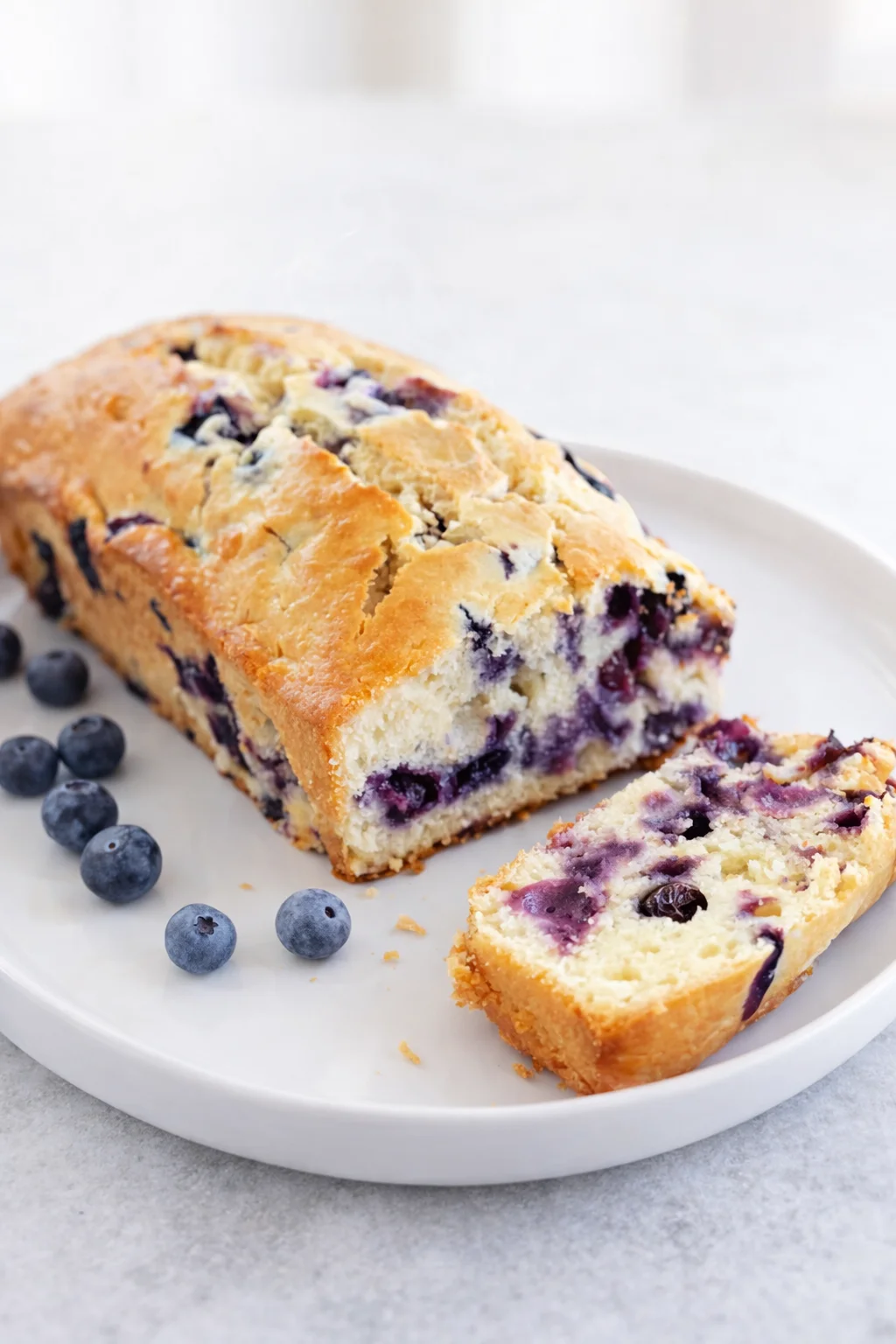 Final plated Blueberry Cream Cheese Bread served as a hero shot
