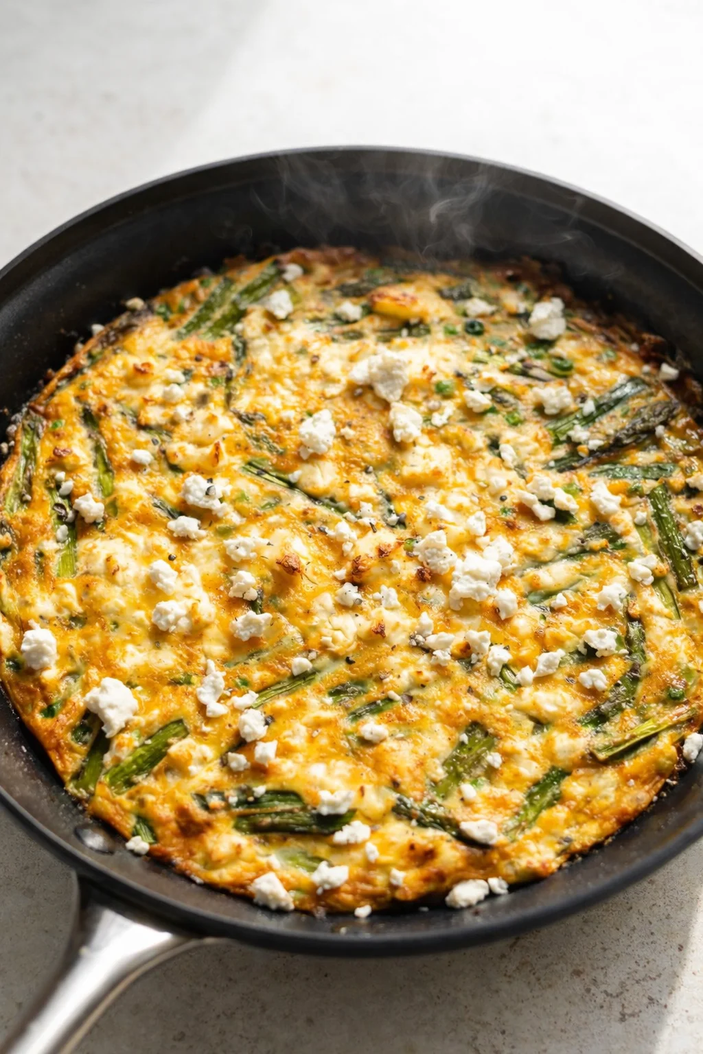 Final plated Asparagus Frittata served as a hero shot