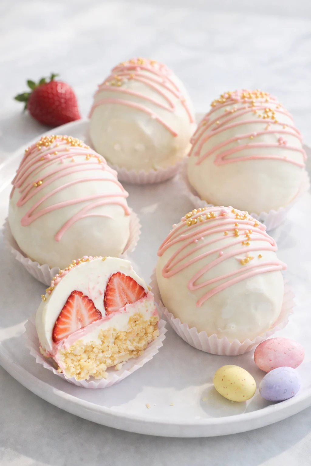 Final plated Strawberry Shortcake Easter Egg Bombs served as a hero shot