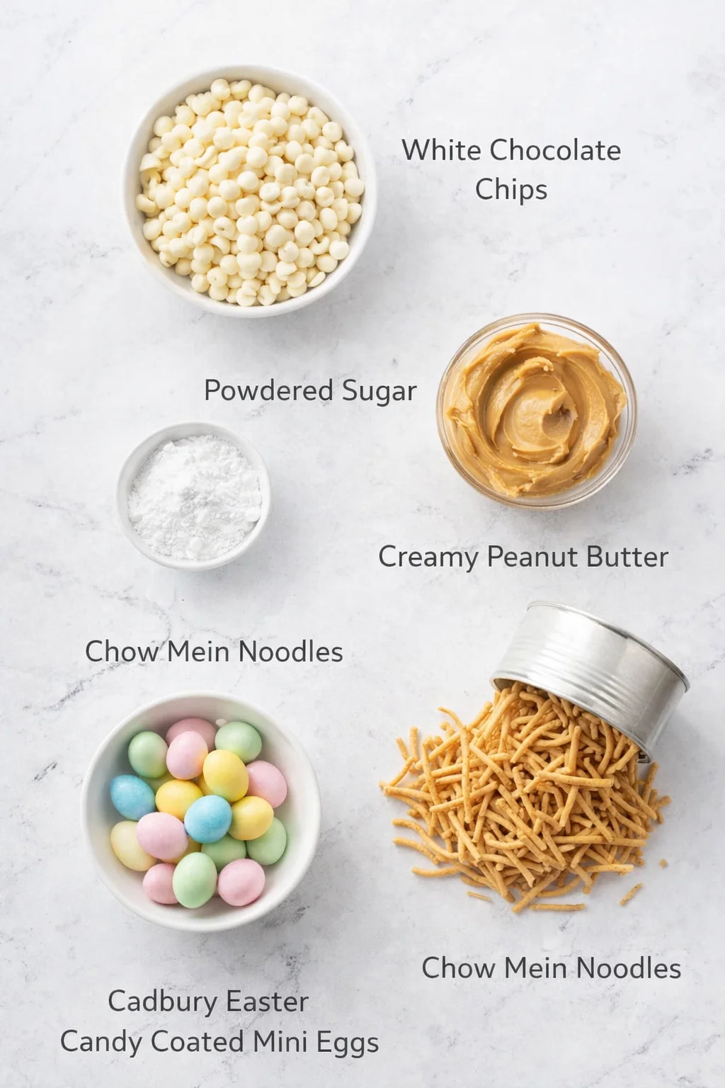 Measured ingredients arranged for Easter Egg Peanut Butter Haystacks | A festive, no-bake, Easter treat!: 1 (11 oz) package white chocolate chips, 2 tablespoons powdered sugar, ¾ cup creamy peanut butter, 1 (8 oz) can ch