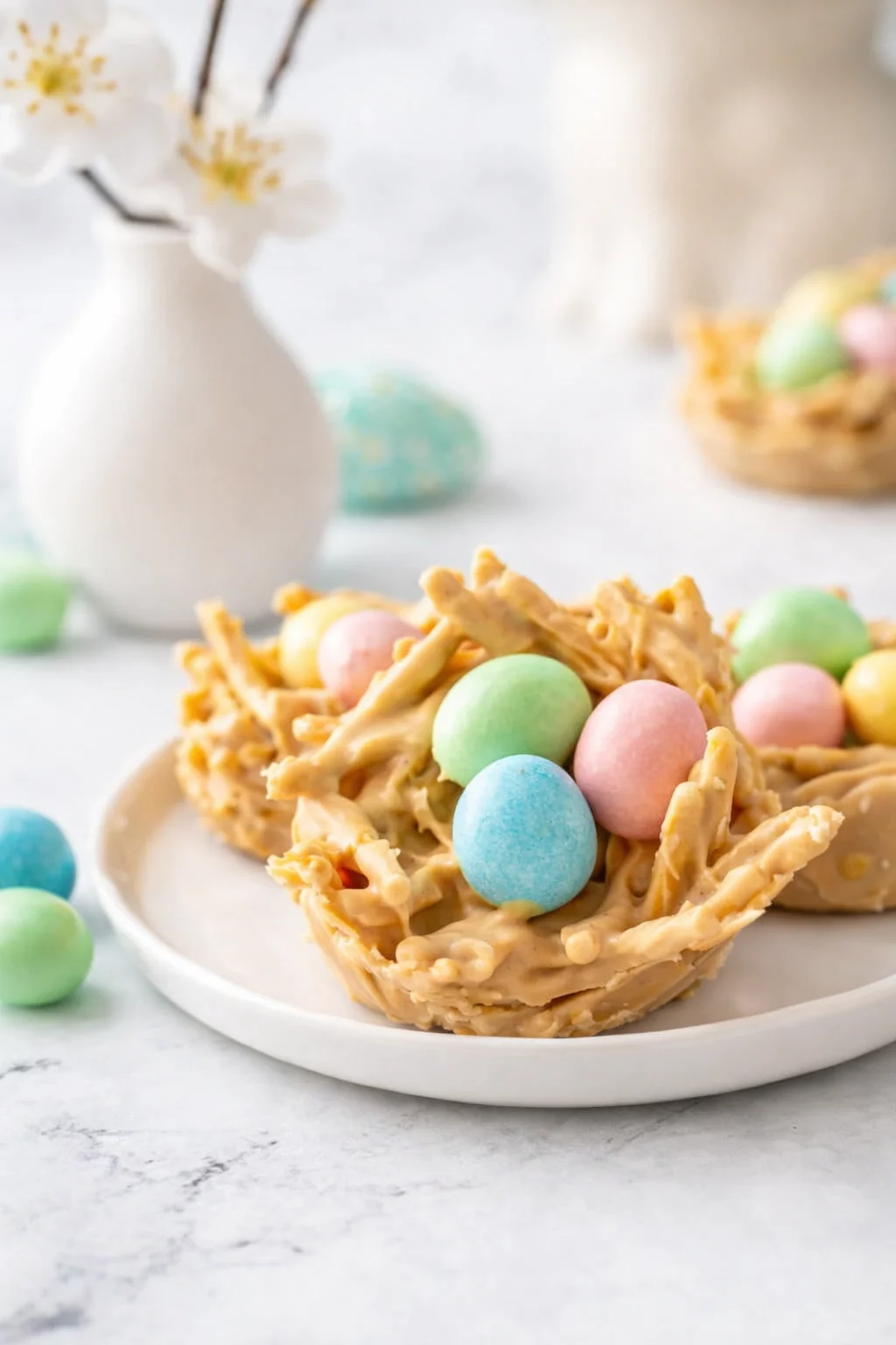 Final plated Easter Egg Peanut Butter Haystacks | A festive, no-bake, Easter treat! served as a hero shot