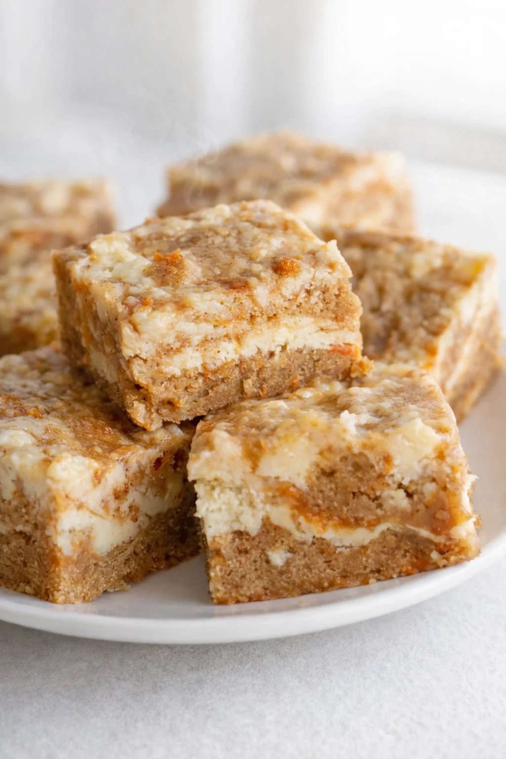 Final plated Carrot Cake Bars served as a hero shot