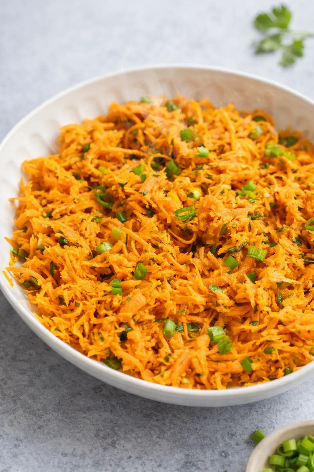 Final plated French Carrot Salad with Lemon Dijon Dressing served as a hero shot