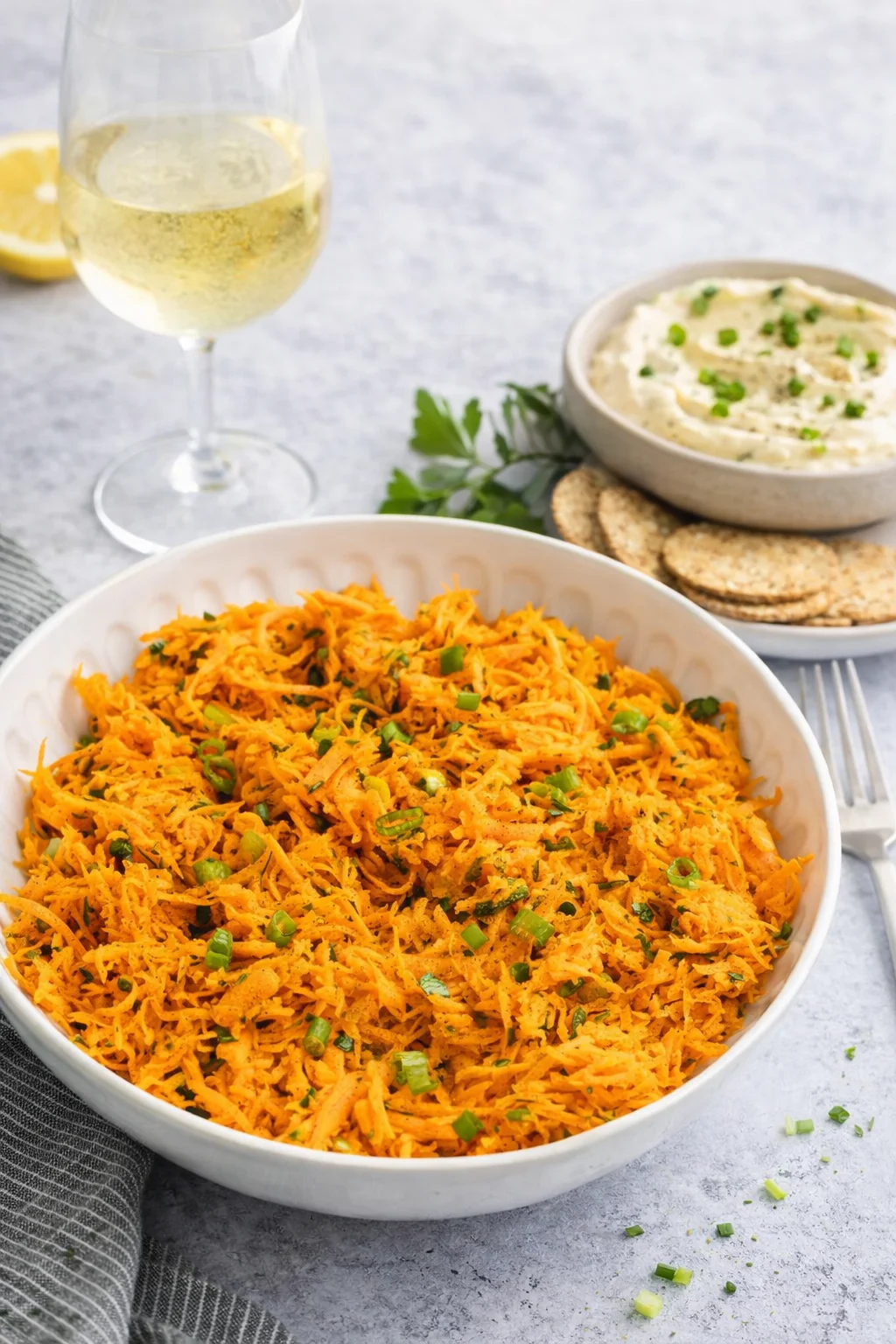 Alternative angle of French Carrot Salad with Lemon Dijon Dressing served with a pairing