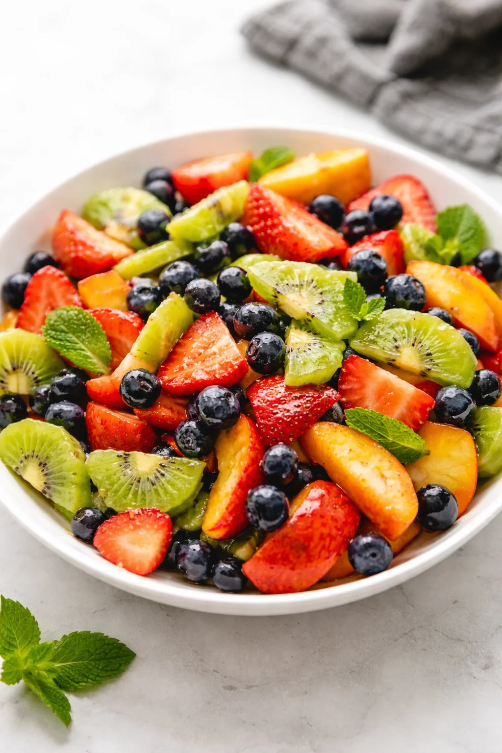 Final plated Fruit Salad with Honey Lime Dressing served as a hero shot