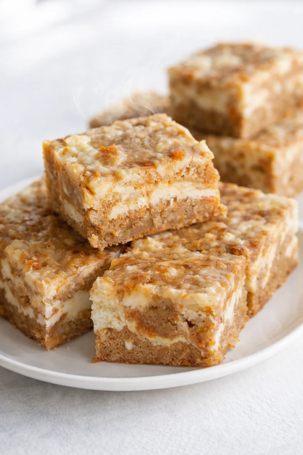Final plated Carrot Cake Bars served as a hero shot