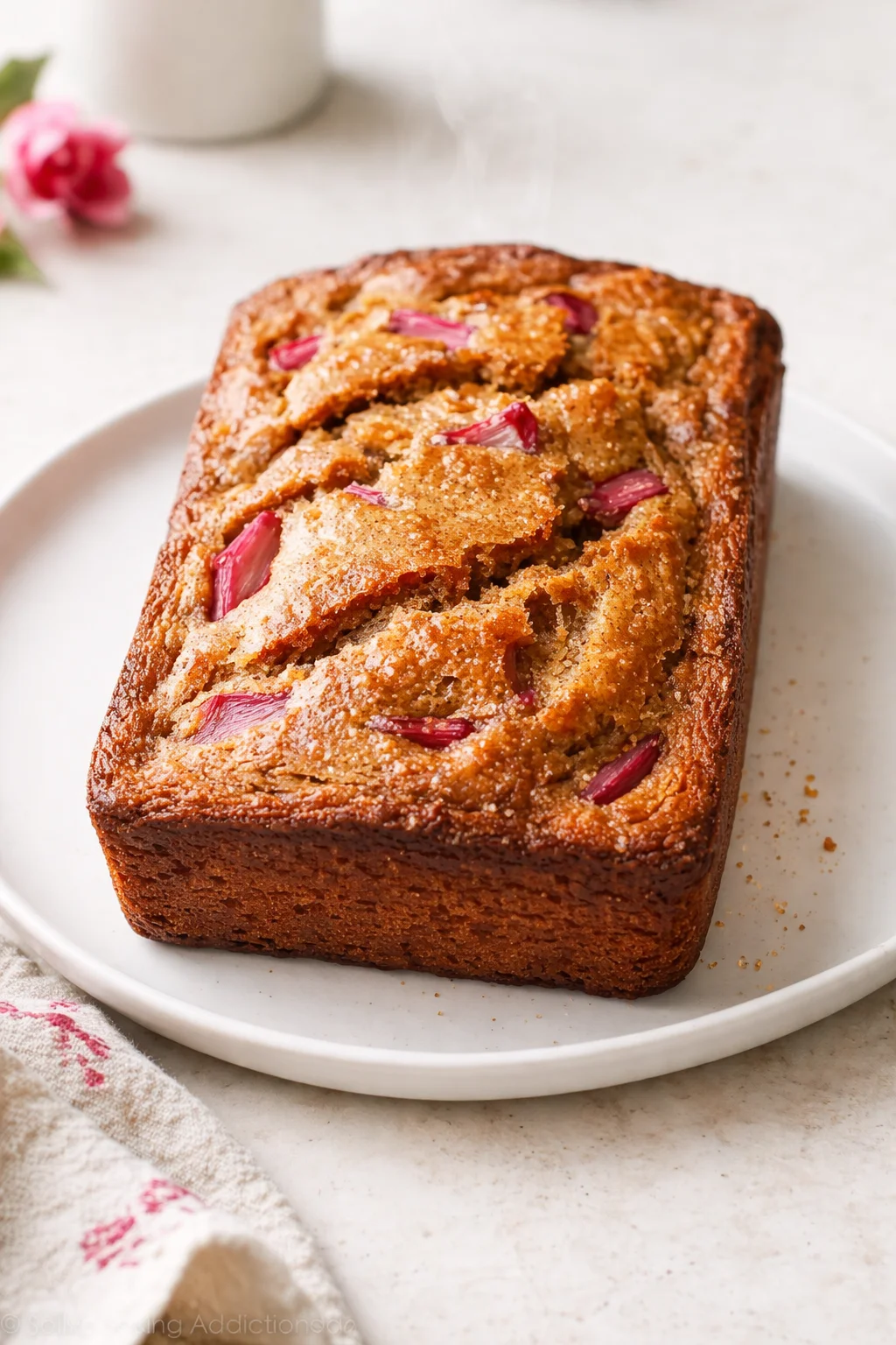 intro_final_dish-placeholder.png Final plated Cinnamon Rhubarb Bread: A Deliciously Unique Recipe! served as a hero shot
