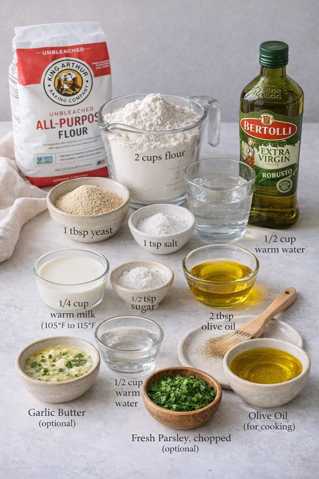 Measured ingredients arranged for Fluffy Greek Pita: 2 cups flour (I always reach for King Arthur all-purpose flour for consistent results), 1 tbsp yeast, 1 tsp salt, 1/2 tsp sugar, 1/4 cup milk (warm but not hot, about 