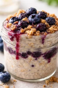 Final plated Blueberry Pie Overnight Oats - The Dish On Healthy served as a hero shot