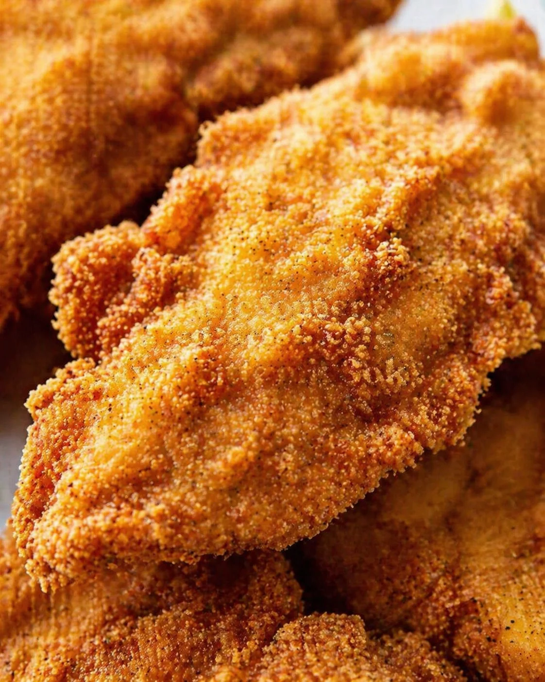 Tight detail shot of Southern Fried Catfish for 4 Servings - Food Revealer highlighting texture