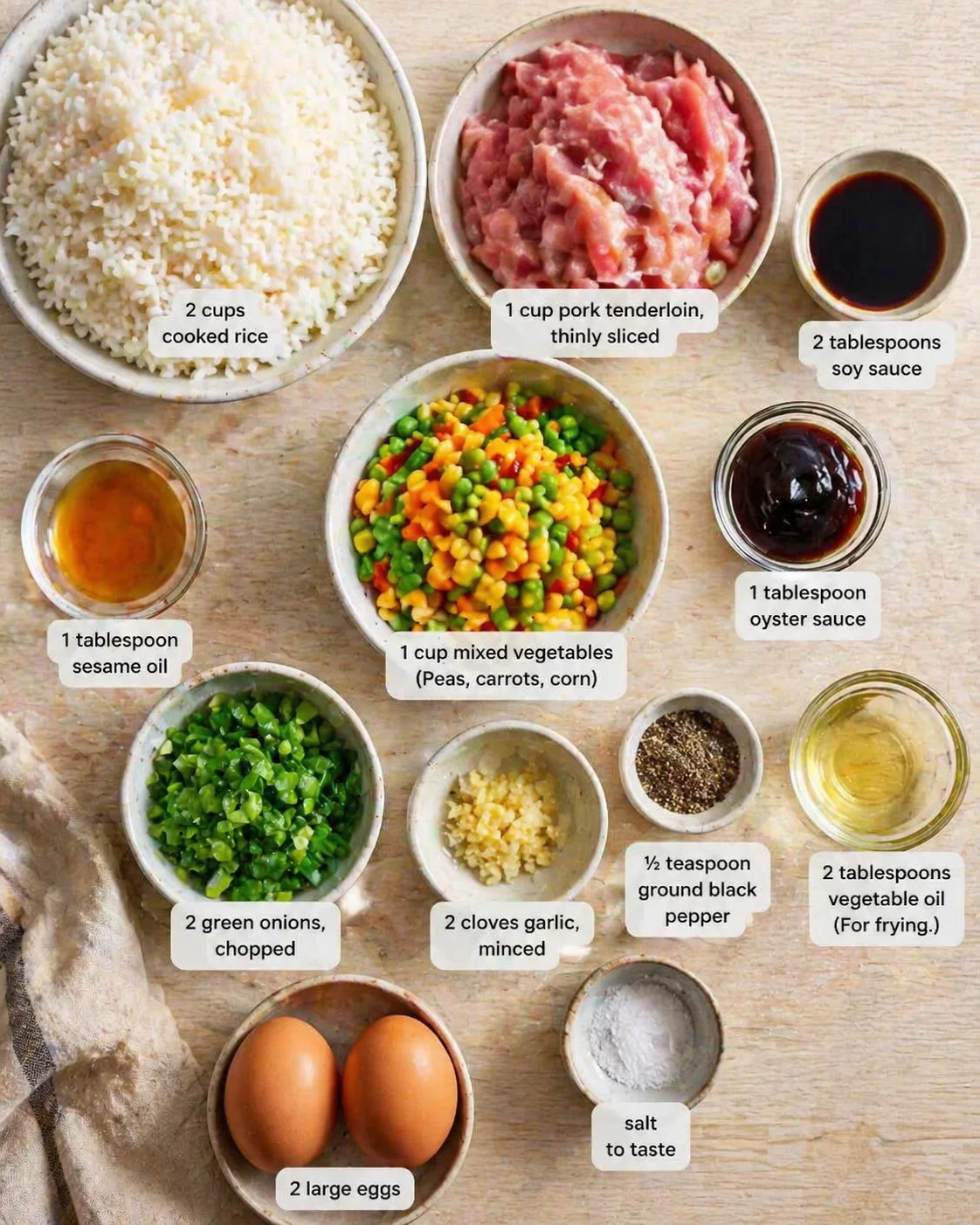 Measured ingredients arranged for Transform Day-old Rice Into Delicious Pork Fried Rice Tonight!: 2 cups cooked rice (Preferably day-old.), 1 cup pork tenderloin, thinly sliced (About 200g.), 2 tablespoons soy sauce, 1 t