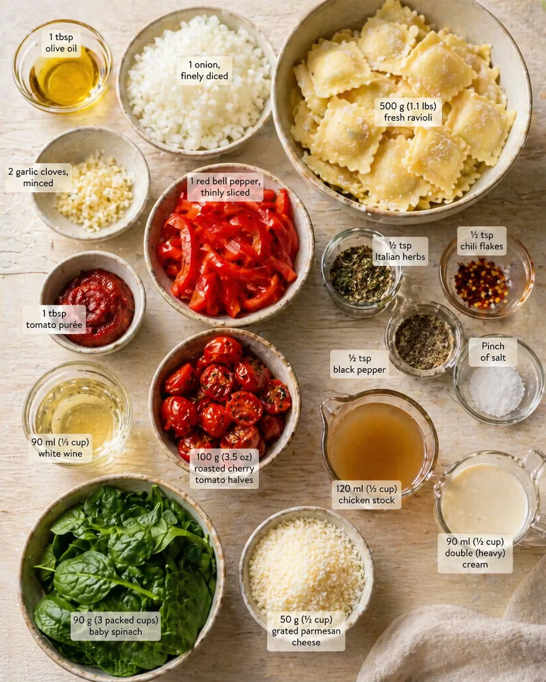 Measured ingredients arranged for Ravioli with Creamy Tomato Sauce - Easy Recipes Ideas: 1 tbsp olive oil, 1 onion, finely diced, 2 garlic cloves, minced, 500 g (1.1 lbs) fresh ravioli (any filling you like), 1 red bell 