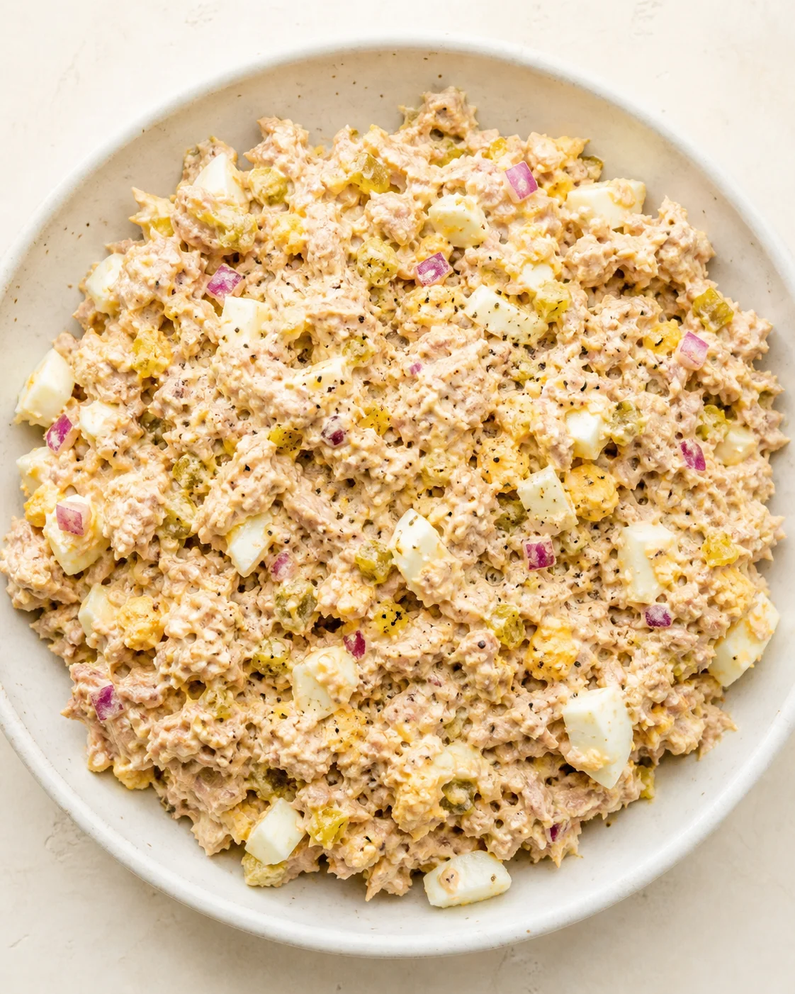Creamy tuna salad with eggs, onions, and pickles in a light mayo.